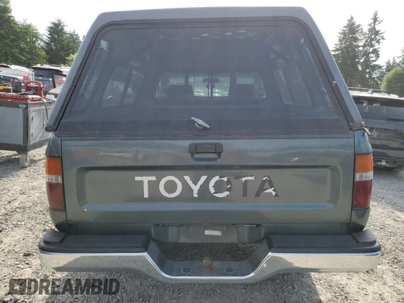 1993 Toyota Pickup DX z VIN JT4RN01P3P7060439, wystawiony jako Copart lot #57356125 z przebiegiem 259 773 mil mil oraz Szkoda całkowita • Salvage title. Historia ofert i sprzedaży dostępna na DreamBid. Obrazek 6.