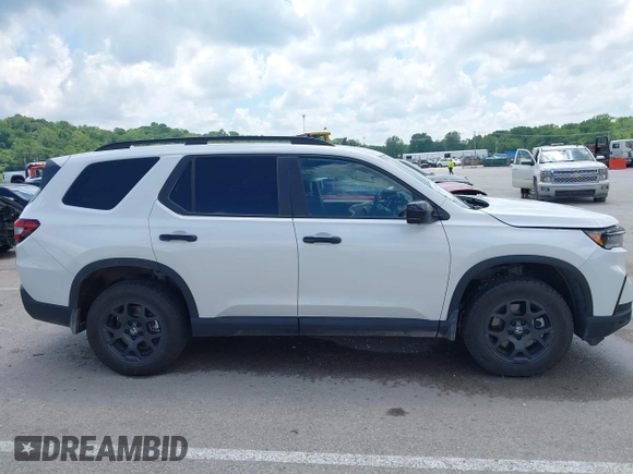 2024 Honda Pilot TrailSport z VIN 5FNYG1H6XRB004763, wystawiony jako IAAI lot #42237606 z przebiegiem 14 819 mil mil oraz . Historia ofert i sprzedaży dostępna na DreamBid. Obrazek 13.