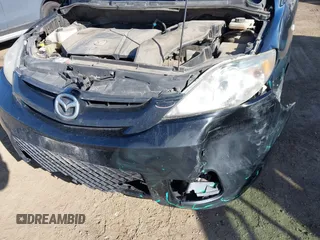 2007 Mazda 5 Touring with VIN JM1CR293970135693, listed as a IAAI auction lot 41976260 with 211,978 mi miles and . Bid and sale history available at carsss.com. Image 6.