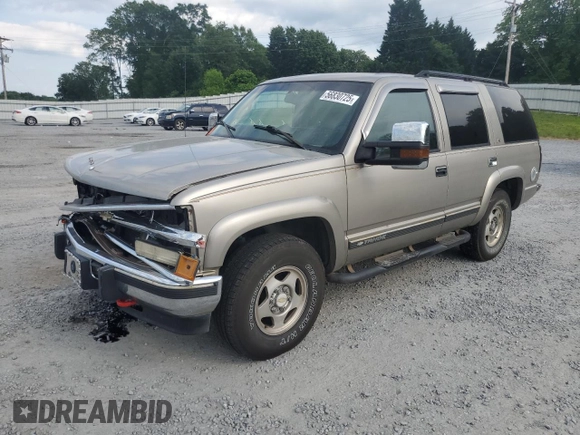 2000 Chevrolet Tahoe Z71 with VIN 1GNEK13R7YR189177, listed as a Copart auction lot 56830725 with 308,270 mi miles and Salvage title. Bid and sale history available at DreamBid. Image 1.