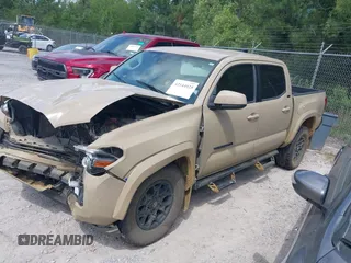 2020 Toyota Tacoma SR5 with VIN 3TMAZ5CN5LM123521, listed as a IAAI auction lot 42144925 with Not provided miles and . Bid and sale history available at DreamBid. Image 2.