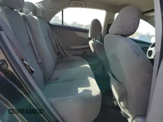 2013 Toyota Corolla L with VIN 5YFBU4EE1DP201779, listed as a Copart auction lot 77087414 with 206,263 mi miles and Salvage Title. Bid and sale history available at carsss.com. Image 10.