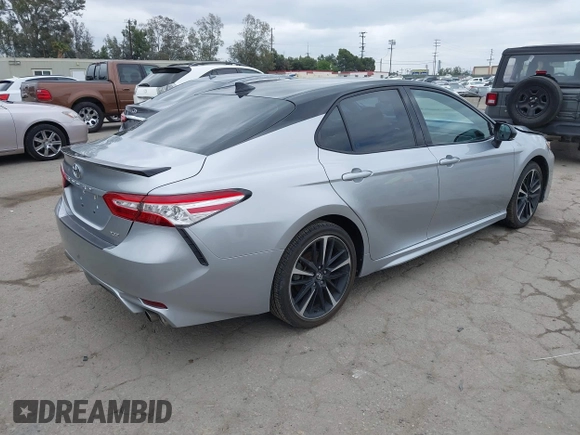 2020 Toyota Camry XSE with VIN 4T1K61AK1LU318098, listed as a IAAI auction lot 42197271 with 64,118 mi miles and . Bid and sale history available at DreamBid. Image 4.