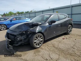 2018 Mazda 3 Touring z VIN 3MZBN1L33JM183668, wystawiony jako Copart lot #55127755 z przebiegiem 126 813 mil mil oraz Szkody całkowita. Historia ofert i sprzedaży dostępna na DreamBid. Obrazek 1.