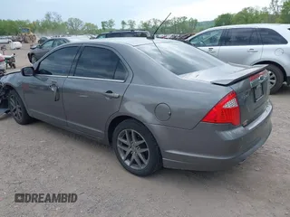 2012 Ford Fusion SEL z VIN 3FAHP0JG0CR410463, wystawiony jako IAAI lot #39357312 z przebiegiem 136 894 mil mil oraz . Historia ofert i sprzedaży dostępna na DreamBid. Obrazek 3.