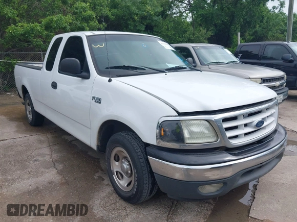 2002 Ford F-150 XL with VIN 1FTRX17202NA10047, listed as a IAAI auction lot 42122396 with 1 mi miles. Bid and sale history available at carsss.com. Image 1.