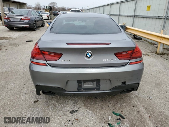 2013 BMW 6 Series 650i xDrive z VIN WBAYM1C53DDZ02397, wystawiony jako Copart lot #48872655 z przebiegiem Nie podano mil oraz Szkoda całkowita • Salvage title. Historia ofert i sprzedaży dostępna na DreamBid. Obrazek 6.