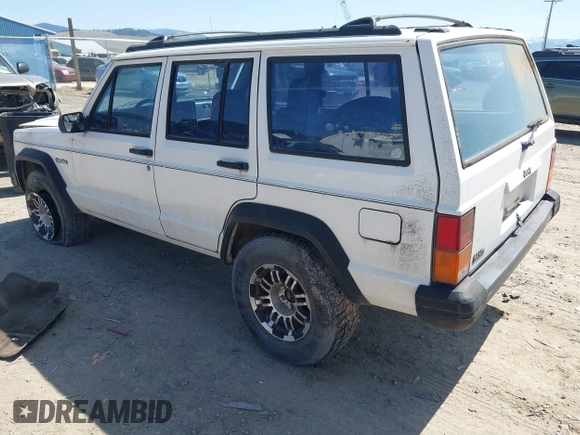 1996 Jeep Cherokee SE with VIN 1J4FT28S7TL307603, listed as a IAAI auction lot 42087278 with 141,994 mi miles. Bid and sale history available at carsss.com. Image 3.