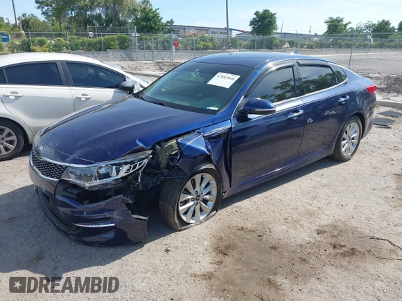 2018 Kia Optima EX with VIN 5XXGU4L32JG261985, listed as a IAAI auction lot 42083868 with 33,264 mi miles and . Bid and sale history available at carsss.com. Image 2.