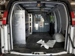 2014 Chevrolet Express Cargo with VIN 1GCSGAFX5E1204664, listed as a IAAI auction lot 42566613 with 103,962 mi miles and . Bid and sale history available at DreamBid. Image 3.