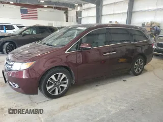 2014 Honda Odyssey Touring with VIN 5FNRL5H93EB117966, listed as a Copart auction lot 63325175 with 109,658 mi miles and Salvage title. Bid and sale history available at DreamBid. Image 1.