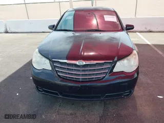 2010 Chrysler Sebring Touring with VIN 1C3CC4FB5AN219937, listed as a IAAI auction lot 41981869 with 147,599 mi miles. Bid and sale history available at carsss.com. Image 6.