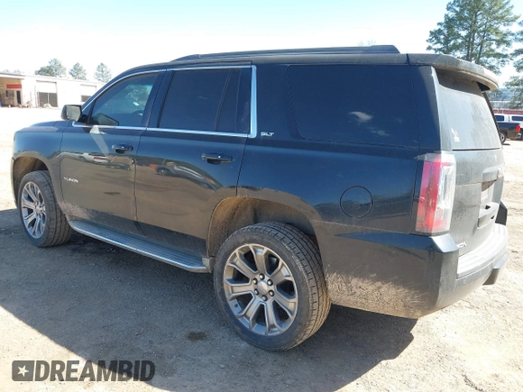 2015 GMC Yukon SLT z VIN 1GKS1BKC8FR112952, wystawiony jako IAAI lot #41836398 z przebiegiem 155 329 mil mil oraz . Historia ofert i sprzedaży dostępna na DreamBid. Obrazek 3.