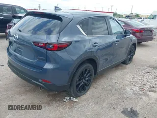 2024 Mazda CX-5 2.5 S Carbon Edition with VIN JM3KFBCL0R0516680, listed as a IAAI auction lot 42140335 with 30,170 mi miles. Bid and sale history available at carsss.com. Image 4.
