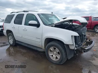 2014 Chevrolet Tahoe LT z VIN 1GNSCBE05ER134226, wystawiony jako IAAI lot #41285778 z przebiegiem 255 812 mil mil oraz . Historia ofert i sprzedaży dostępna na DreamBid. Obrazek 1.