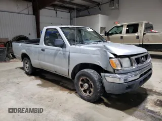 2000 Nissan Frontier XE z VIN 1N6DD21S1YC392012, wystawiony jako Copart lot #41843855 z przebiegiem 208 449 mil mil oraz Szkoda całkowita • Salvage title. Historia ofert i sprzedaży dostępna na DreamBid. Obrazek 4.