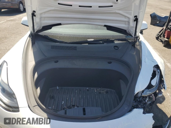 2023 Tesla Model 3 with VIN 5YJ3E1EA8PF394705, listed as a Copart auction lot 52319945 with 58,193 mi miles and Salvage title. Bid and sale history available at DreamBid. Image 11.