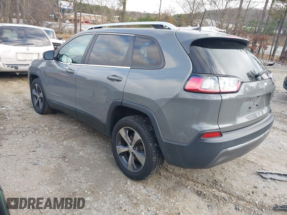 2020 Jeep Cherokee Limited with VIN 1C4PJLDBXLD502858, listed as a IAAI auction lot 41148184 with 73,509 mi miles. Bid and sale history available at carsss.com. Image 3.