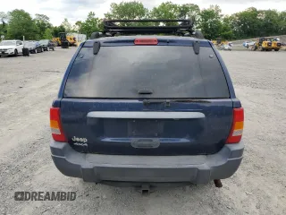 2004 Jeep Grand Cherokee Laredo with VIN 1J4GW48S64C160831, listed as a Copart auction lot 61920005 with 135,243 mi miles and Clean title. Bid and sale history available at DreamBid. Image 6.