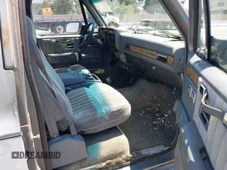 1990 GMC Suburban with VIN 1GKGR26NXLF528203, listed as a IAAI auction lot 42731684 with 185,736 mi miles and . Bid and sale history available at DreamBid. Image 5.