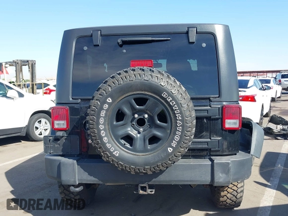 2014 Jeep Wrangler Sport with VIN 1C4AJWAG7EL100344, listed as a IAAI auction lot 42020438 with 87,279 mi miles and . Bid and sale history available at carsss.com. Image 16.
