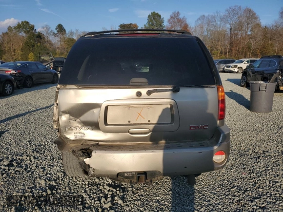 2003 GMC Envoy SLE with VIN 1GKDS13S732156385, listed as a Copart auction lot 79925184 with 233,958 mi miles and Salvage Title. Bid and sale history available at carsss.com. Image 6.