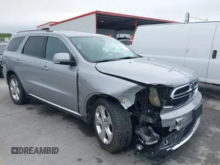 2014 Dodge Durango Limited with VIN 1C4SDHDT7EC344477, listed as a IAAI auction lot 42354498 with 174,806 mi miles and . Bid and sale history available at DreamBid. Image 1.