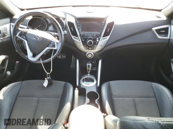 2016 Hyundai Veloster with VIN KMHTC6AD7GU248608, listed as a Copart auction lot 65809693 with 104,784 mi miles. Bid and sale history available at carsss.com. Image 8.