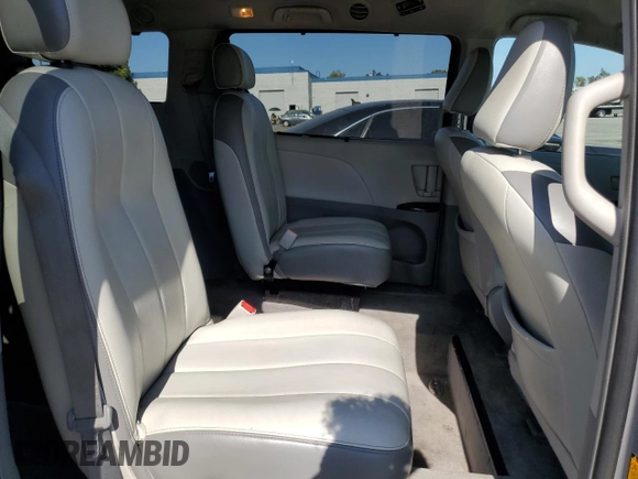 2013 Toyota Sienna LE AAS z VIN 5TDKK3DC5DS282857, wystawiony jako Copart lot #57984075 z przebiegiem 148 876 mil mil oraz Szkoda całkowita • Salvage title. Historia ofert i sprzedaży dostępna na DreamBid. Obrazek 11.