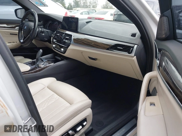 2018 BMW 5 Series 530e with VIN WBAJA9C5XJB033667, listed as a IAAI auction lot 42107936 with 55,753 mi miles and . Bid and sale history available at DreamBid. Image 5.