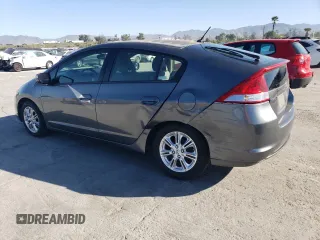 2010 Honda Insight EX with VIN JHMZE2H73AS039935, listed as a Copart auction lot 46192575 with 127,329 mi miles and Salvage Title. Bid and sale history available at DreamBid. Image 2.