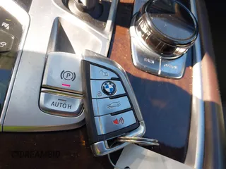 2017 BMW 7 Series 750i with VIN WBA7F0C34HGM21738, listed as a IAAI auction lot 41772933 with 62,923 mi miles and . Bid and sale history available at carsss.com. Image 11.