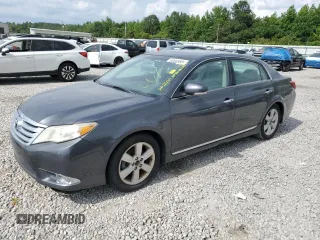 2011 Toyota Avalon z VIN 4T1BK3DB5BU416584, wystawiony jako Copart lot #59989935 z przebiegiem 103 709 mil mil oraz Czysty tytuł • Clean title. Historia ofert i sprzedaży dostępna na DreamBid. Obrazek 1.