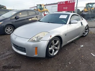 2006 Nissan 350Z with VIN JN1AZ34D06M307164, listed as a IAAI auction lot 41207211 with 158,023 mi miles. Bid and sale history available at carsss.com. Image 17.