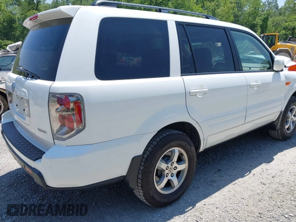 2007 Honda Pilot EX-L with VIN 5FNYF18587B000332, listed as a IAAI auction lot 42403191 with 192,771 mi miles and . Bid and sale history available at DreamBid. Image 4.