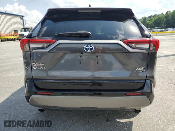 2021 Toyota RAV4 Hybrid XSE with VIN 2T3E6RFV8MW005489, listed as a Copart auction lot 56984825 with 92,632 mi miles and Salvage title. Bid and sale history available at DreamBid. Image 6.