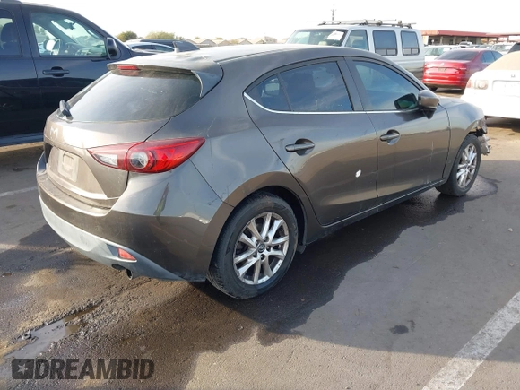 2015 Mazda 3 i Touring with VIN 3MZBM1L74FM236410, listed as a IAAI auction lot 41339253 with 119,731 mi miles and . Bid and sale history available at DreamBid. Image 4.