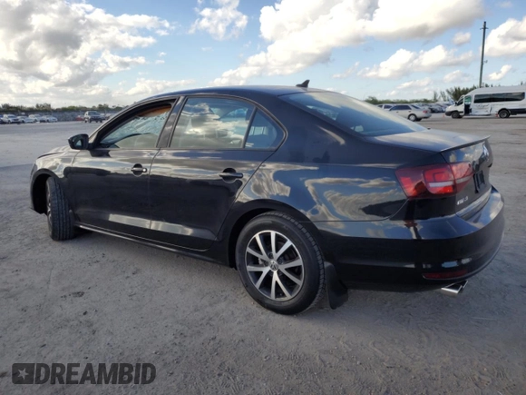 2016 Volkswagen Jetta Sedan 1.4T SE with VIN 3VWD67AJ0GM390490, listed as a Copart auction lot 44711055 with 185,046 mi miles and Salvage Title. Bid and sale history available at carsss.com. Image 2.