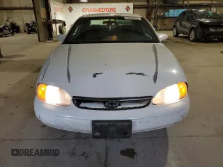 1999 Chevrolet Monte Carlo LS with VIN 2G1WW12M4X9298849, listed as a Copart auction lot 57808255 with 125,443 mi miles and Salvage title. Bid and sale history available at DreamBid. Image 5.