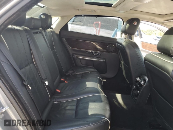 2015 Jaguar XJ Portfolio with VIN SAJWJ2GD2F8V75238, listed as a Copart auction lot 73633984 with 102,545 mi miles and Salvage title. Bid and sale history available at DreamBid. Image 10.