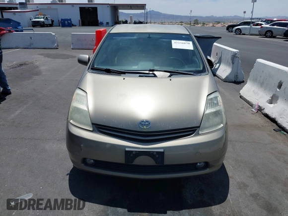2005 Toyota Prius with VIN JTDKB20U950123255, listed as a IAAI auction lot 42256870 with 226,904 mi miles and . Bid and sale history available at DreamBid. Image 6.