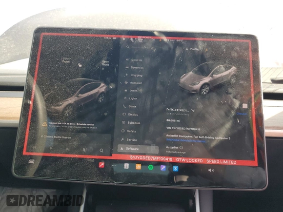 2021 Tesla Model Y Standard Range with VIN 5YJYGDED7MF109418, listed as a Copart auction lot 51590135 with 86,668 mi miles and Salvage Title. Bid and sale history available at DreamBid. Image 9.