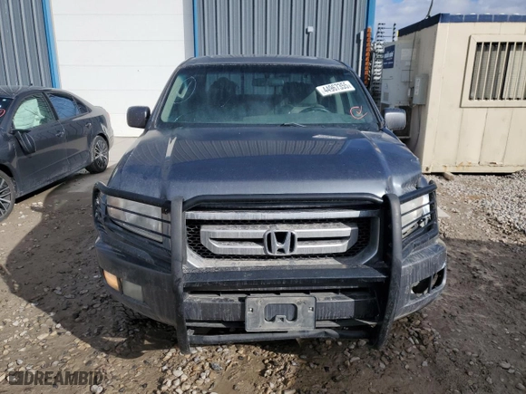 2010 Honda Ridgeline RTL with VIN 5FPYK1F58AB006922, listed as a Copart auction lot 44967355 with 202,067 mi miles and Salvage Title. Bid and sale history available at carsss.com. Image 5.