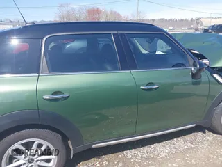 2016 MINI Countryman S z VIN WMWZC5C50GWU03242, wystawiony jako IAAI lot #41912462 z przebiegiem 68 477 mil mil oraz . Historia ofert i sprzedaży dostępna na DreamBid. Obrazek 14.