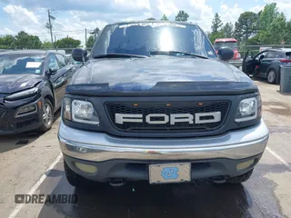 2001 Ford F-150 XLT z VIN 1FTRW08LX1KD56482, wystawiony jako IAAI lot #42155153 z przebiegiem 340 009 mil mil oraz . Historia ofert i sprzedaży dostępna na DreamBid. Obrazek 6.