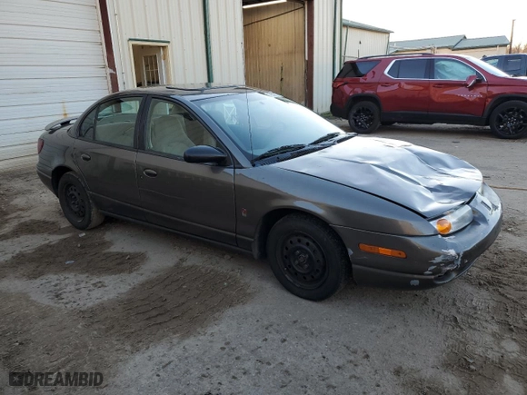 2000 Saturn SL with VIN 1G8ZJ5274YZ256204, listed as a Copart auction lot 79502124 with 190,120 mi miles and Salvage Title. Bid and sale history available at carsss.com. Image 4.