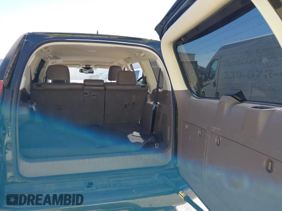 2010 Lexus GX 460 with VIN JTJBM7FX7A5001593, listed as a IAAI auction lot 41838302 with 145,484 mi miles and . Bid and sale history available at DreamBid. Image 8.