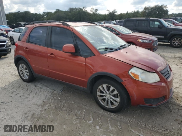 2013 Suzuki SX4 with VIN JS2YB5A42D6100038, listed as a Copart auction lot 73148344 with 141,675 mi miles and Salvage Title. Bid and sale history available at DreamBid. Image 4.