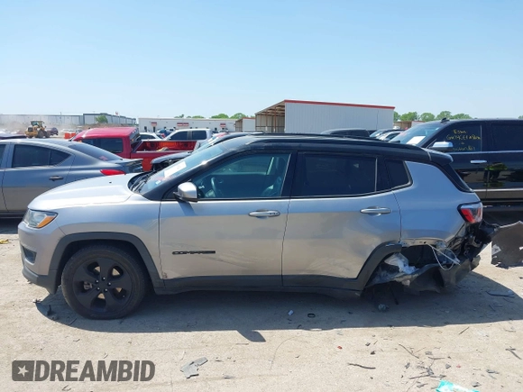 2018 Jeep Compass Latitude with VIN 3C4NJDBB3JT304145, listed as a IAAI auction lot 42008241 with 52,642 mi miles and . Bid and sale history available at DreamBid. Image 14.