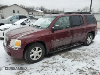2003 GMC Envoy SLT z VIN 1GKET16S536182134, wystawiony jako Copart lot #87765275 z przebiegiem 86 310 mil mil oraz Tytuł czysty. Historia ofert i sprzedaży dostępna na DreamBid. Obrazek 1.
